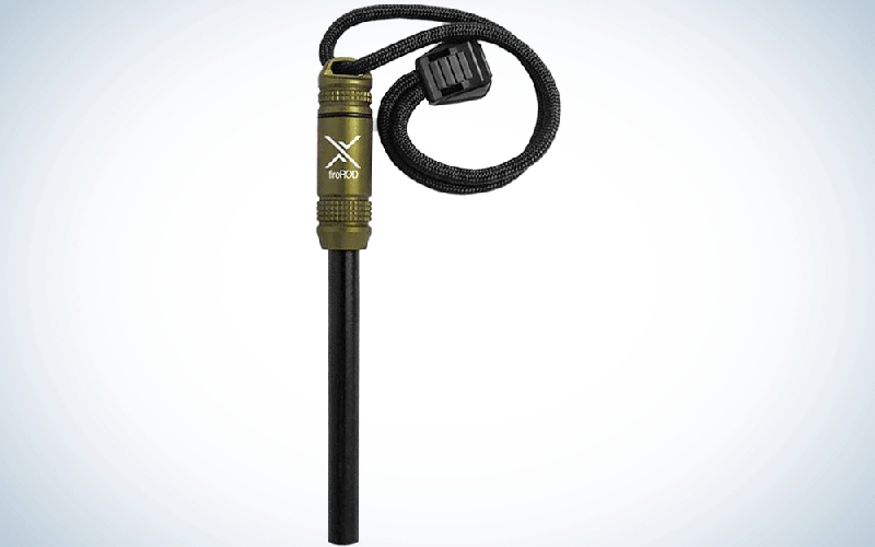 A green and black ferro rod