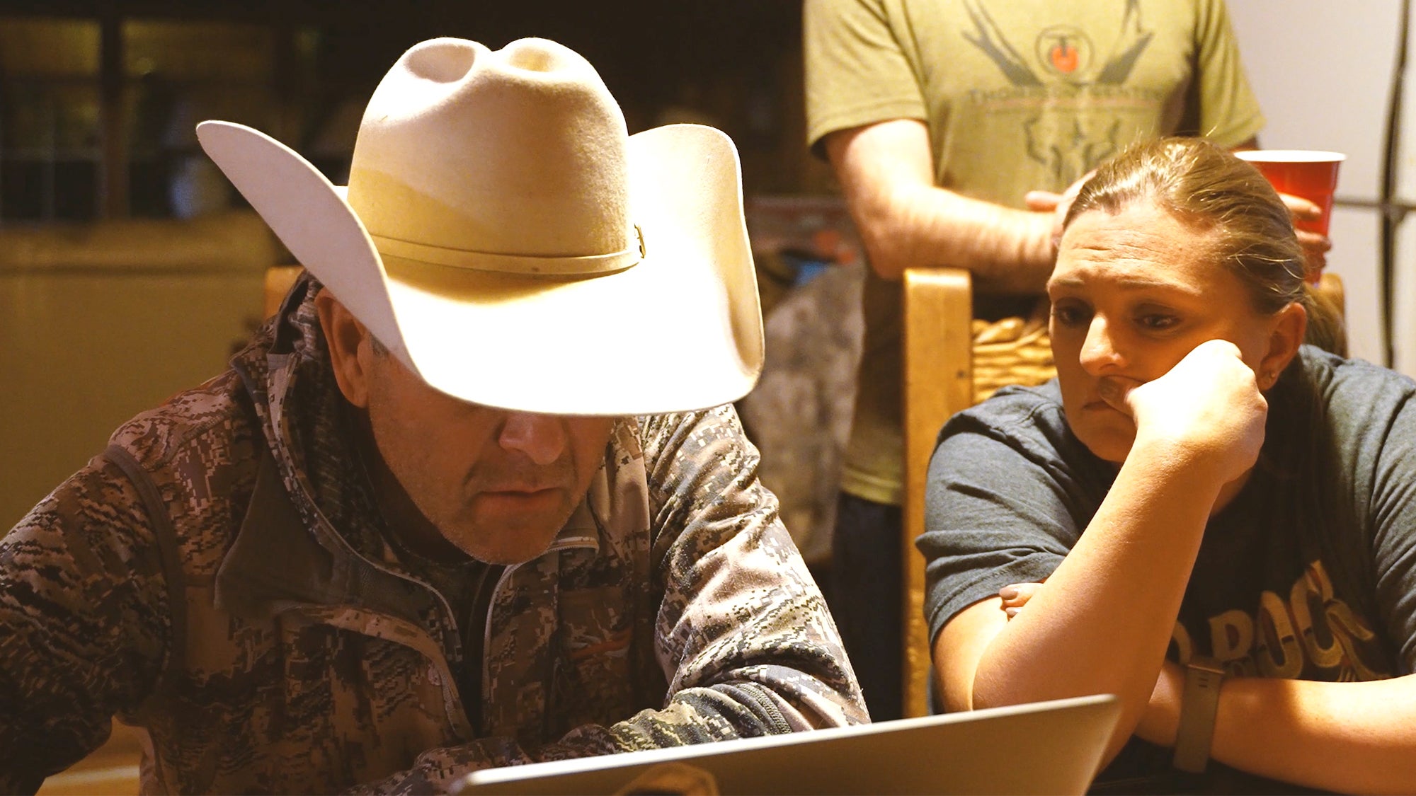 photo of guide and hunter checking aoudad film