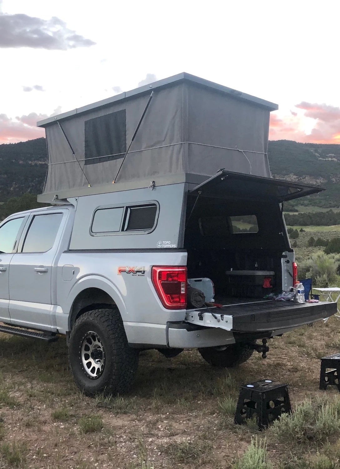 off road pop up camper on a pick up truck.