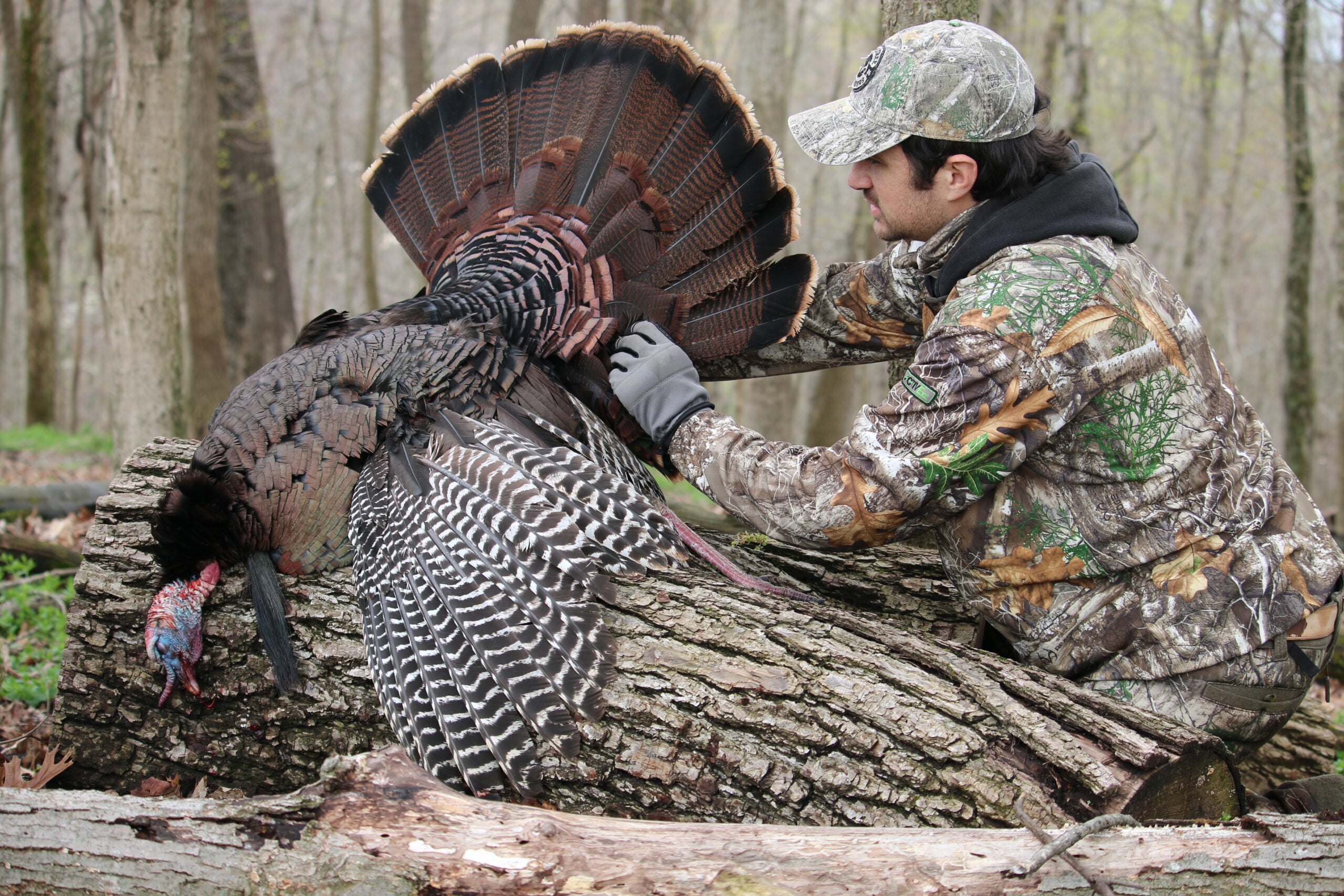 photo of hunter with turkey