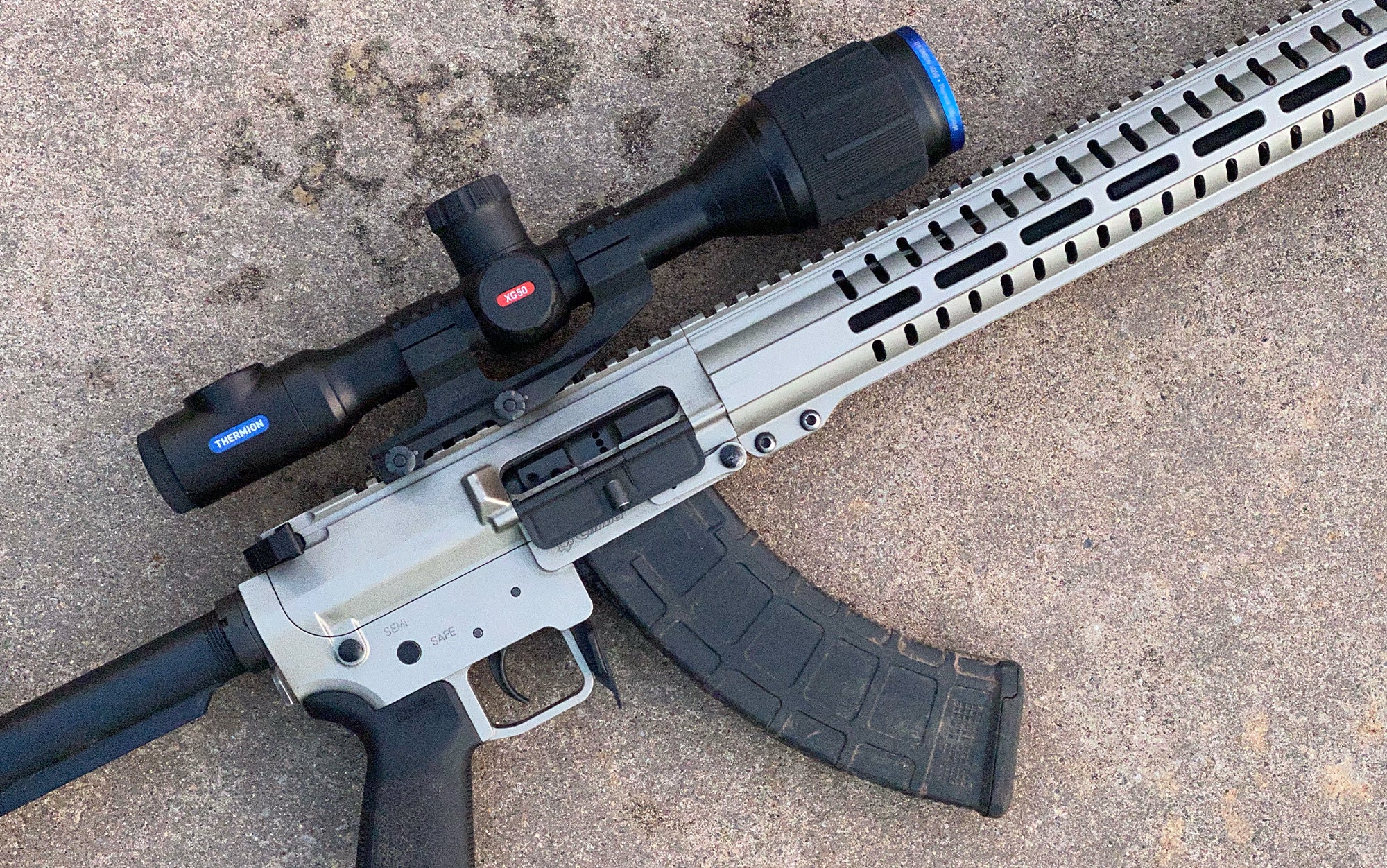 The Pulsar Thermion mounted on a rifle.