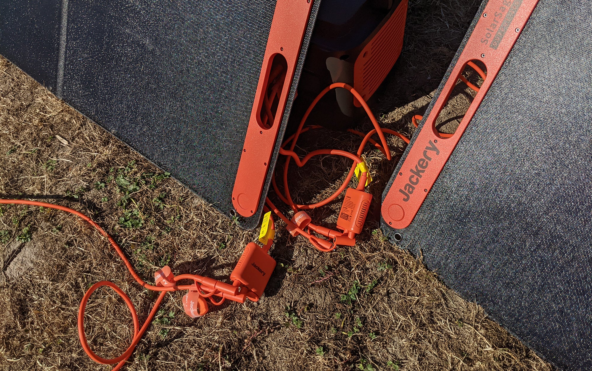 Four cables from each of the panels connected to two solar panels hooked up to the battery makes for a big cable-y mess.