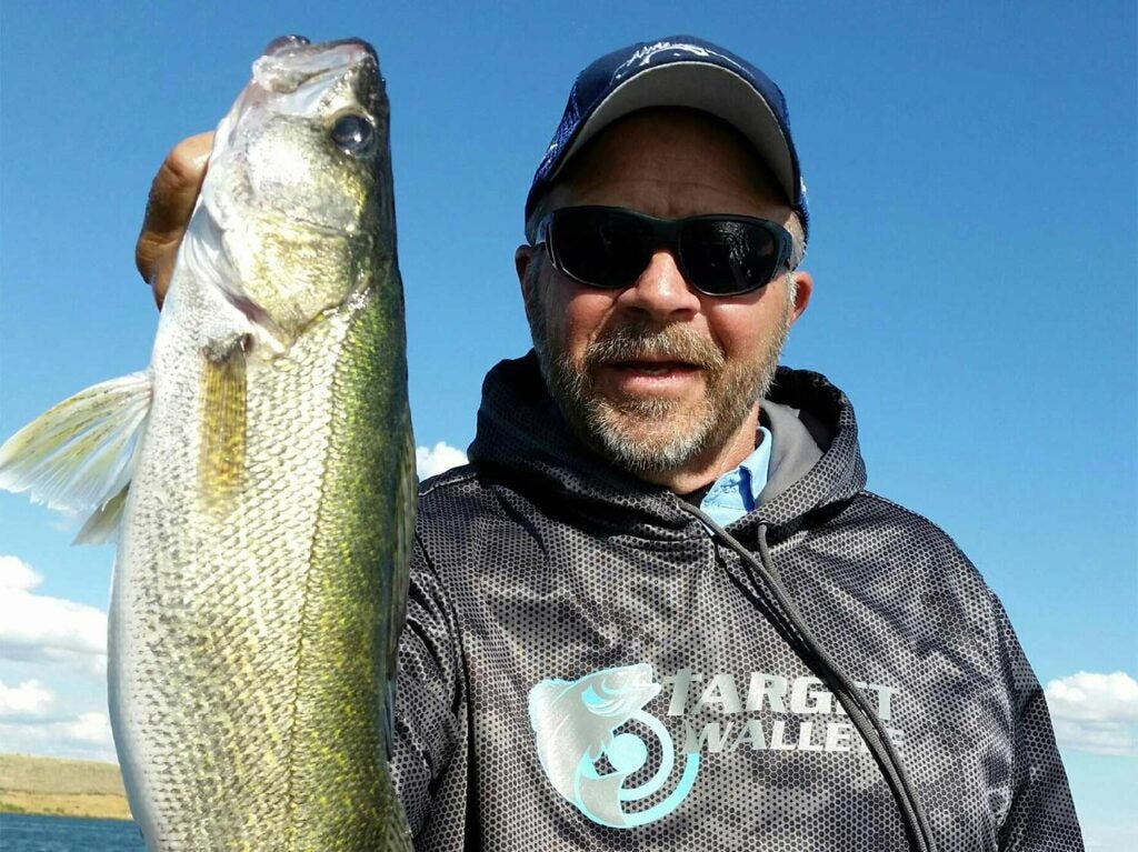 Jim Kalkofen holding a fish