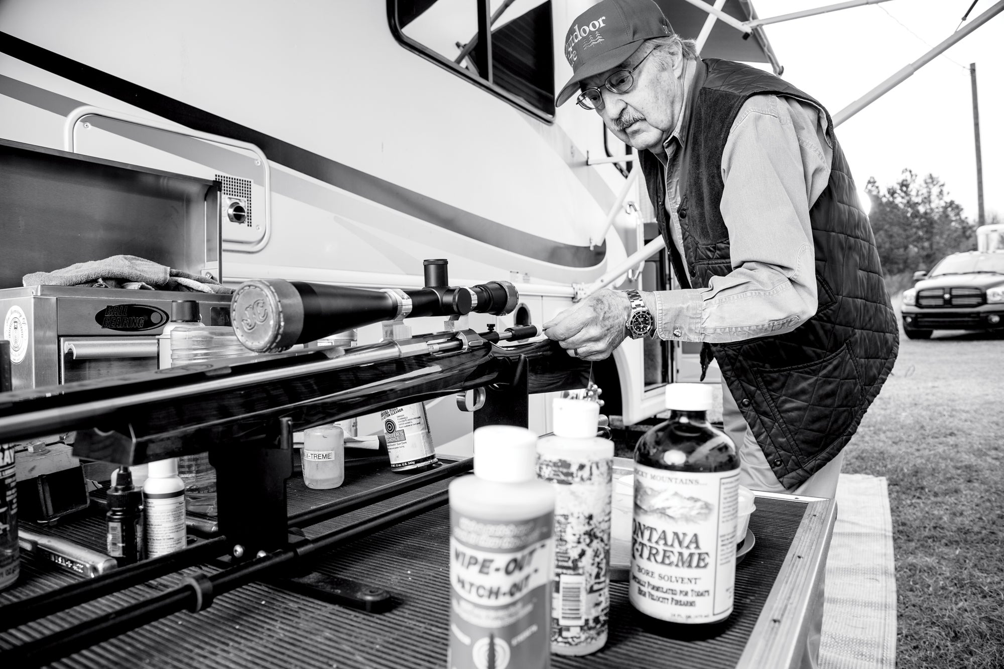 Jim Carmichel cleans a rifle.