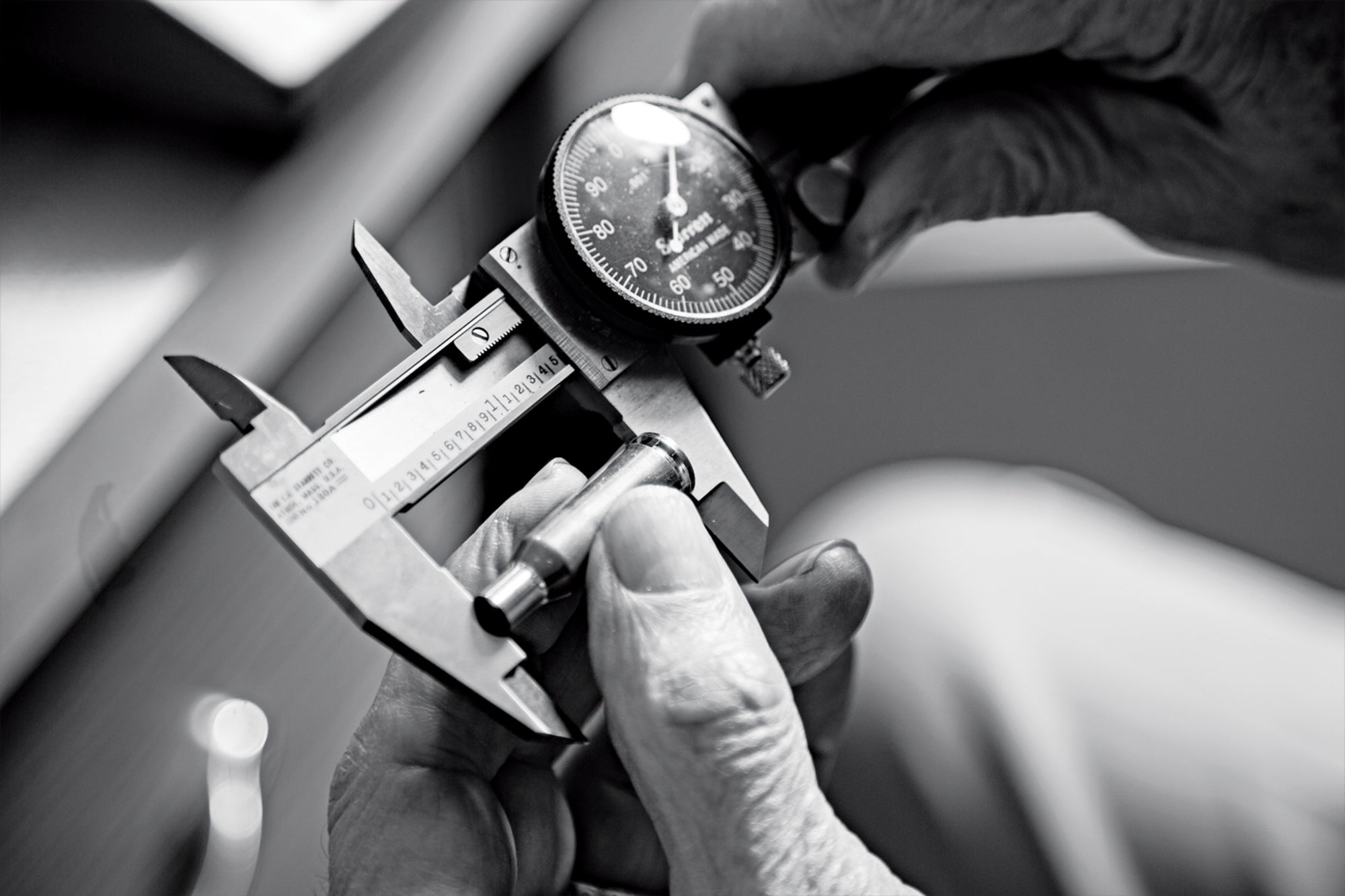 Caliper on an empty cartridge casing.