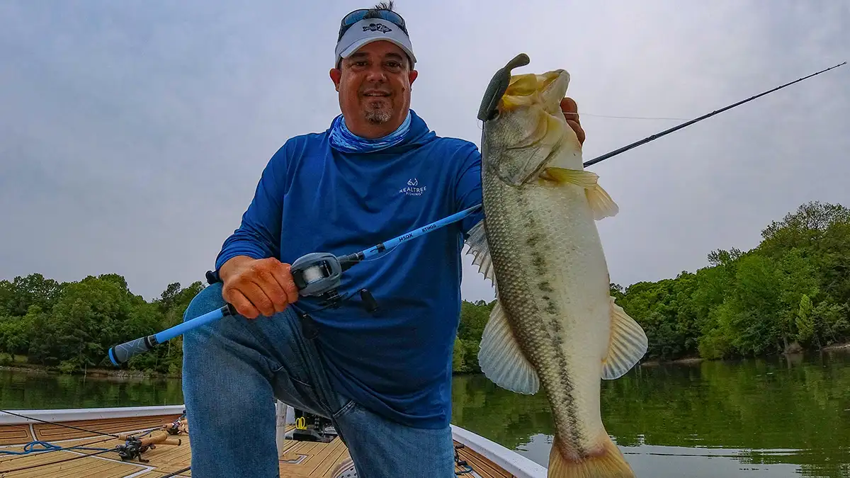 Jason with a nice male fry guarder largemouth on the Yamatanuki