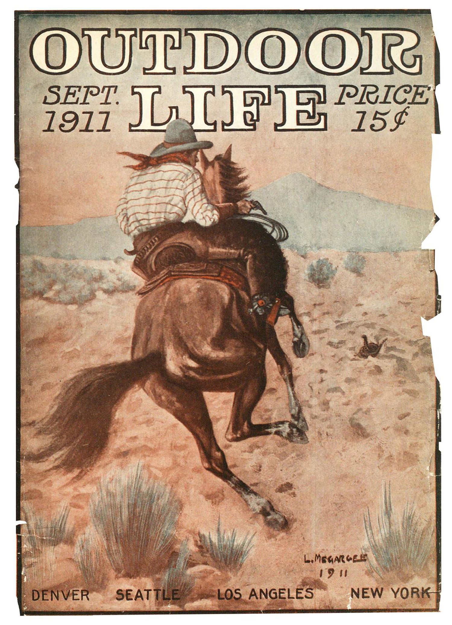 September 1911: A cowboy rides up on a rattler.
