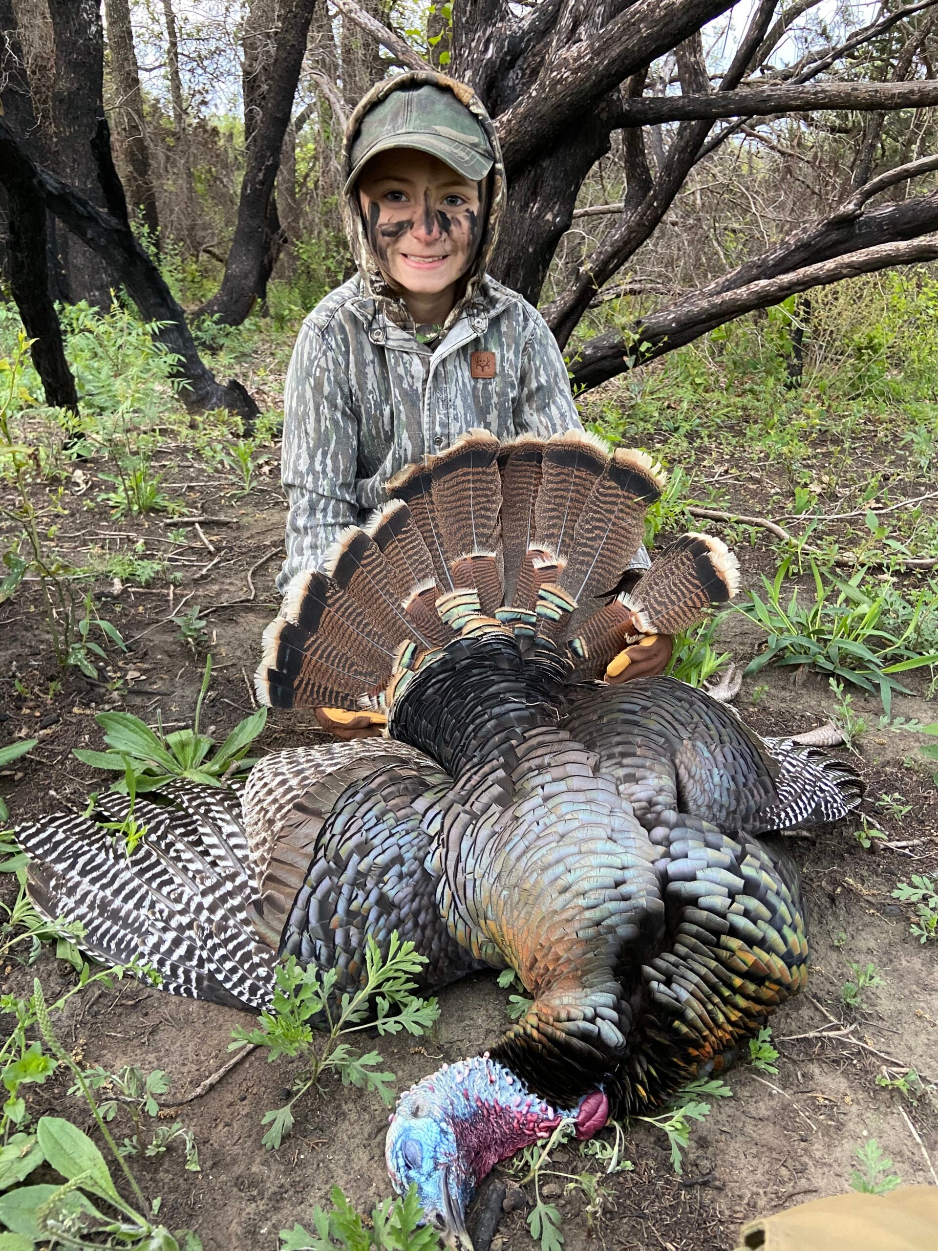 photo of boy with turkey