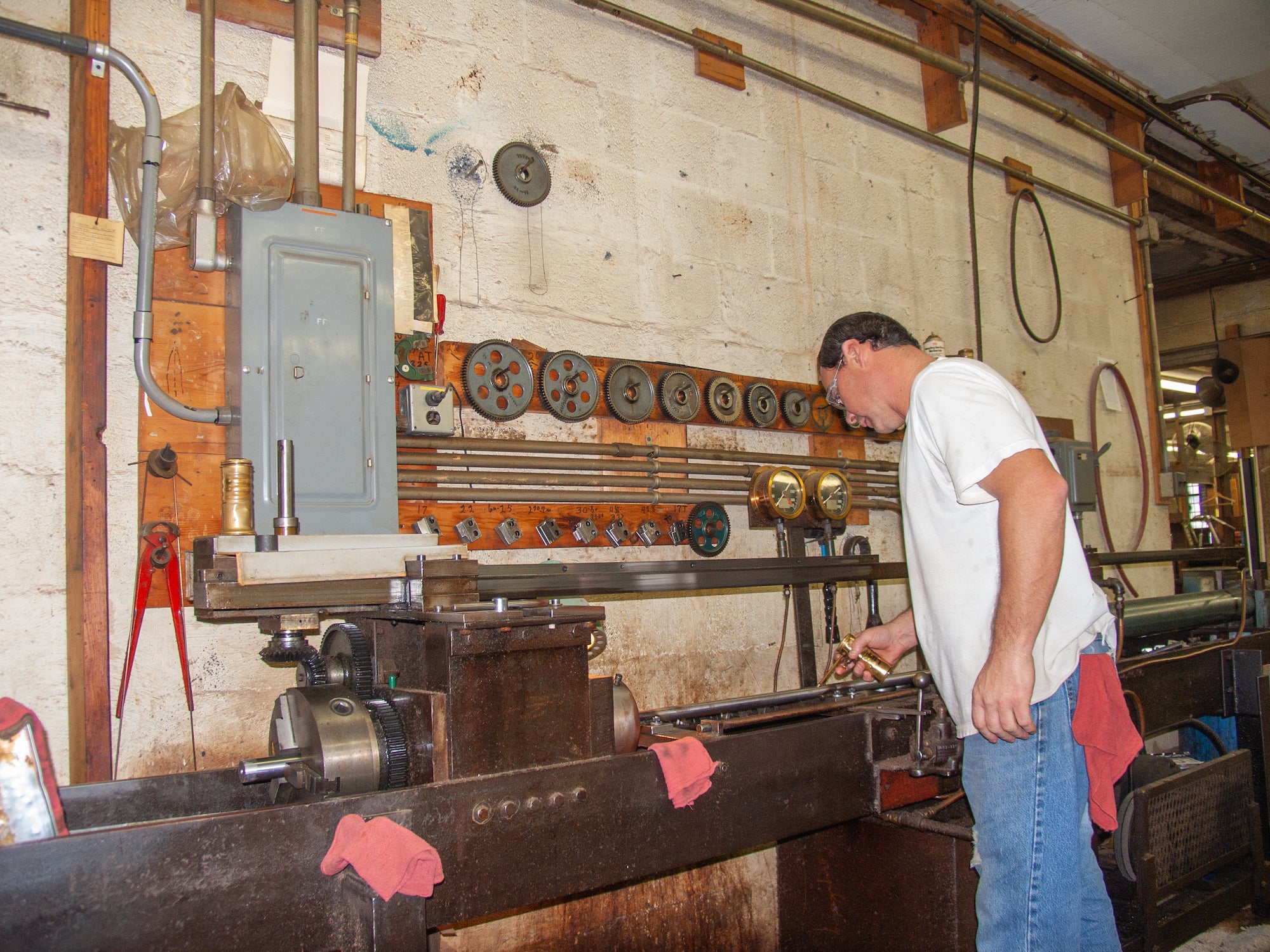 Rifle barrel maker in a shop.