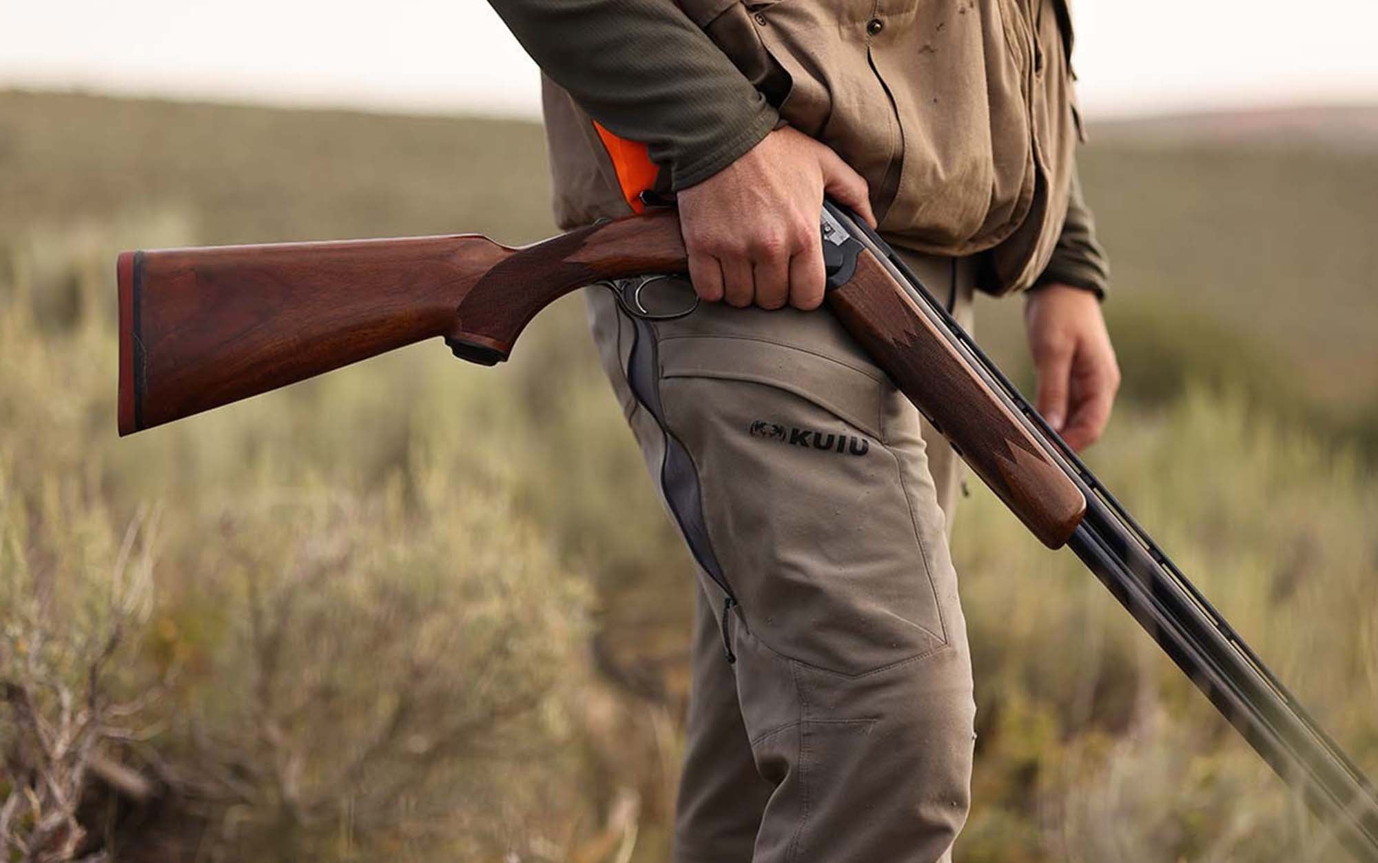 Man walking in some of the best upland hunting pants.