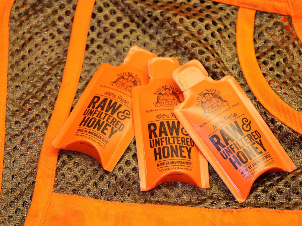 Packets of raw honey in a first aid kit for dogs. 
