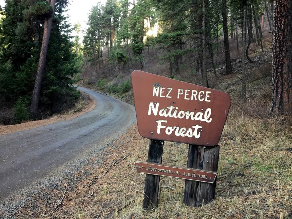 A welcome sign outside the Nez Perce National Forest.