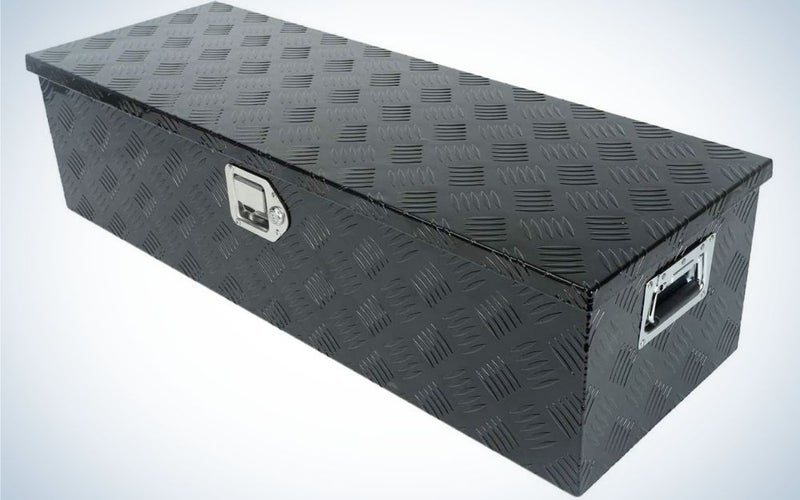 A wide box in the shape of a large rectangle which is all black and in the middle and on the side there are two silver holders.