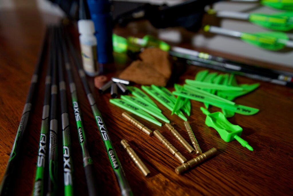 Axis shafts and components laid out on a table