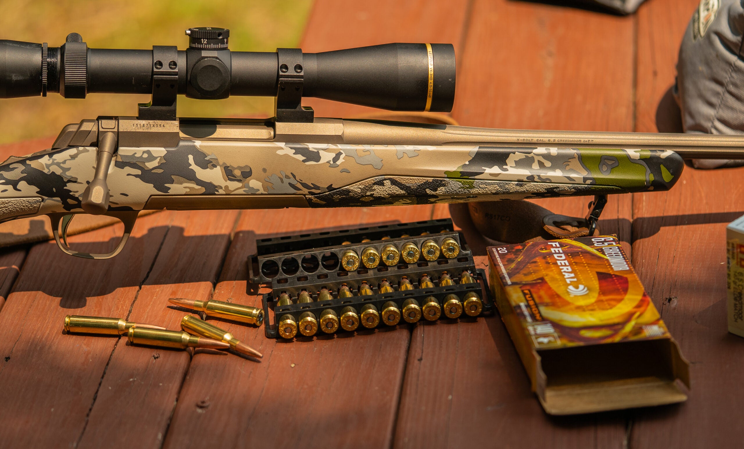 photo of F&S rifle test accessories including scope and ammo