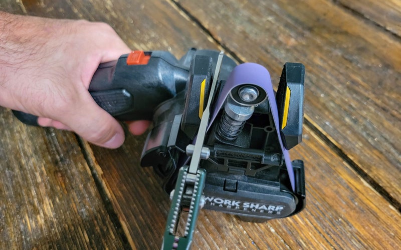The Work Sharp MK.2 electric knife sharpener in use.