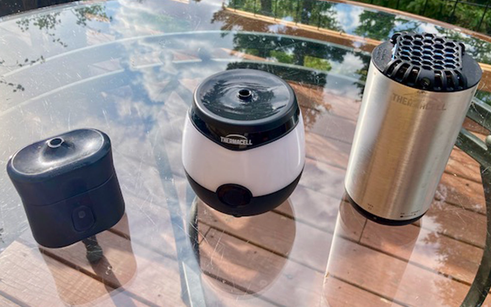 The EX90, EL55, and Patio Shield from Thermacell sit in a line.