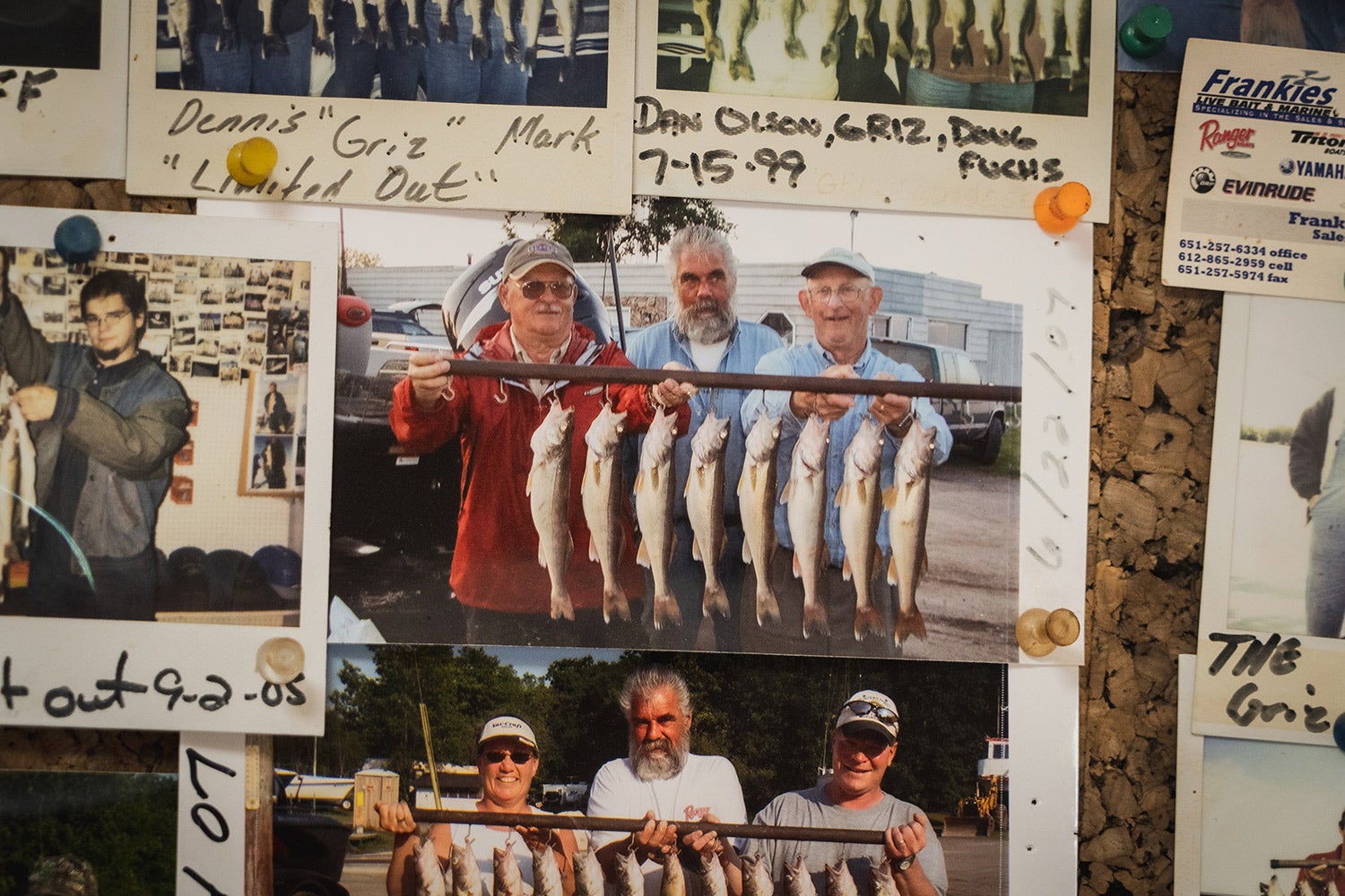 cork board hold photos of the griz with many happy clients