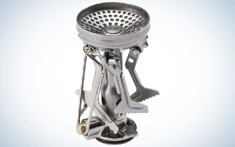 A thin silver backpacking stove