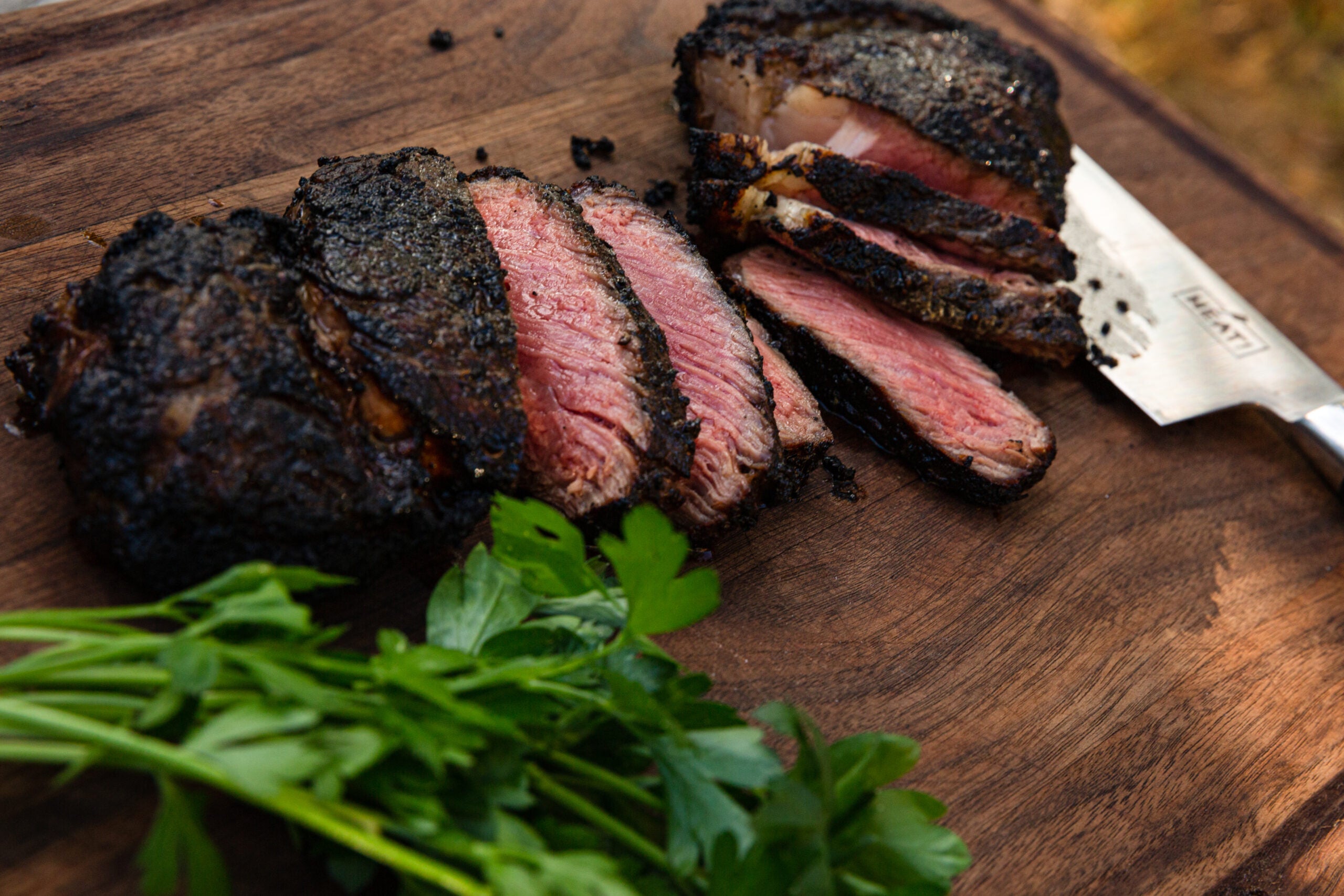 sliced steak cooked at camp