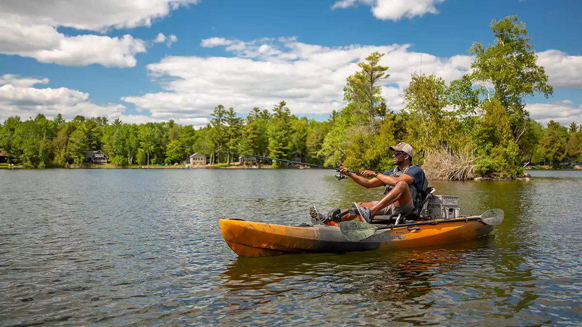 old town fishing kayak angler casting