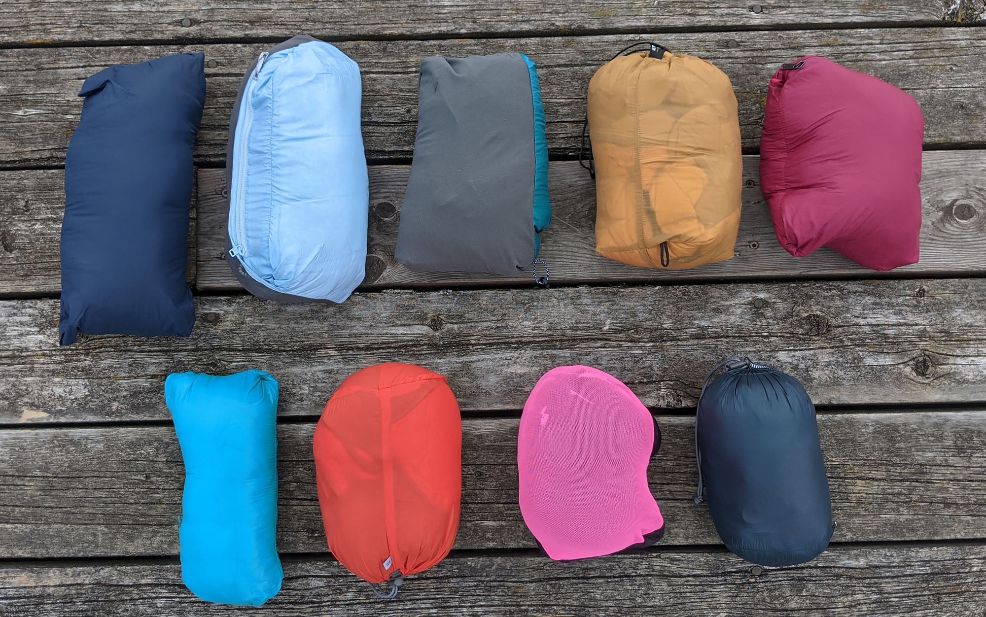 Top row, from left: Fjallraven Expedition Pack Down Hoodie, Big Agnes Luna, Outdoor Research Helium Down Hoodie, Arcâteryx Cerium Hoody, Cotopaxi Fuego Down Hooded Jacket. 

Bottom row, from left: Mountain Hardwear Ghost Whisperer 2, Rab Microlight Alpine Jacket, Crazy Levity, Rab Mythic Alpine Light Jacket.