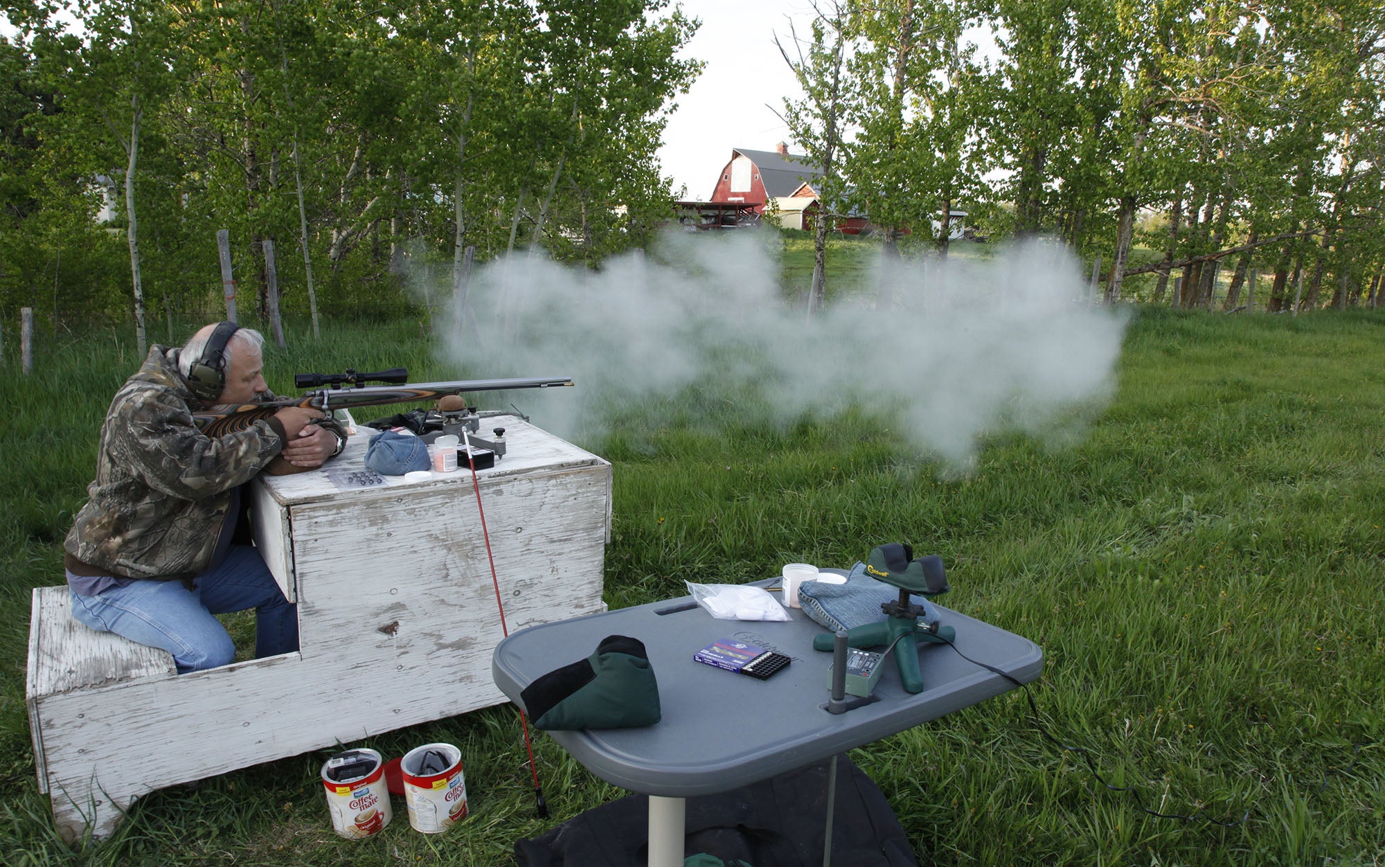 The author testing the Knight Disc Extreme at the range.