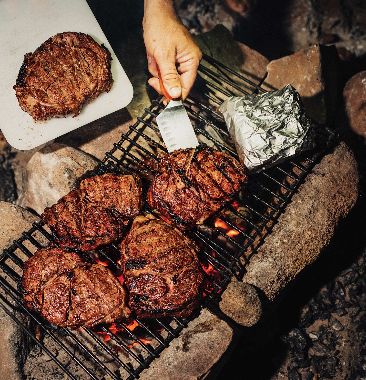 steaks on outdoor grill