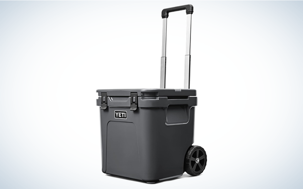 Yeti Wheeled Roadie on gray and white background
