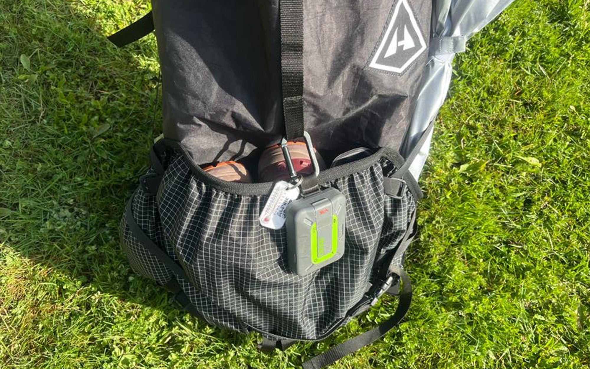 The front pocket is spacious and secure for even larger items, like shoes.