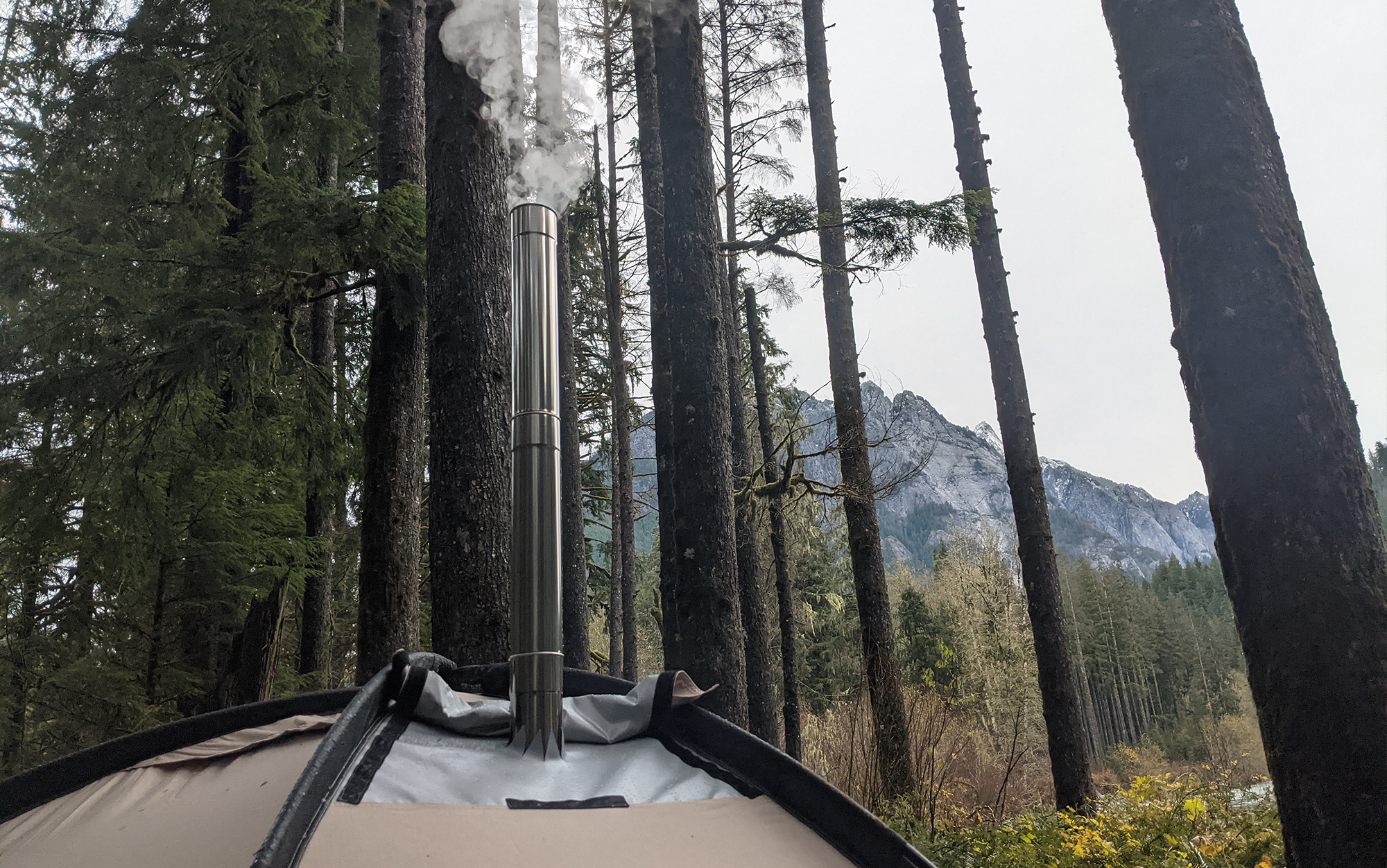 The nesting pipes of the Nortent Stainless Steel Stove are easy to assemble and quickly pipe smoke from your wood-burning stove out of your tent. 