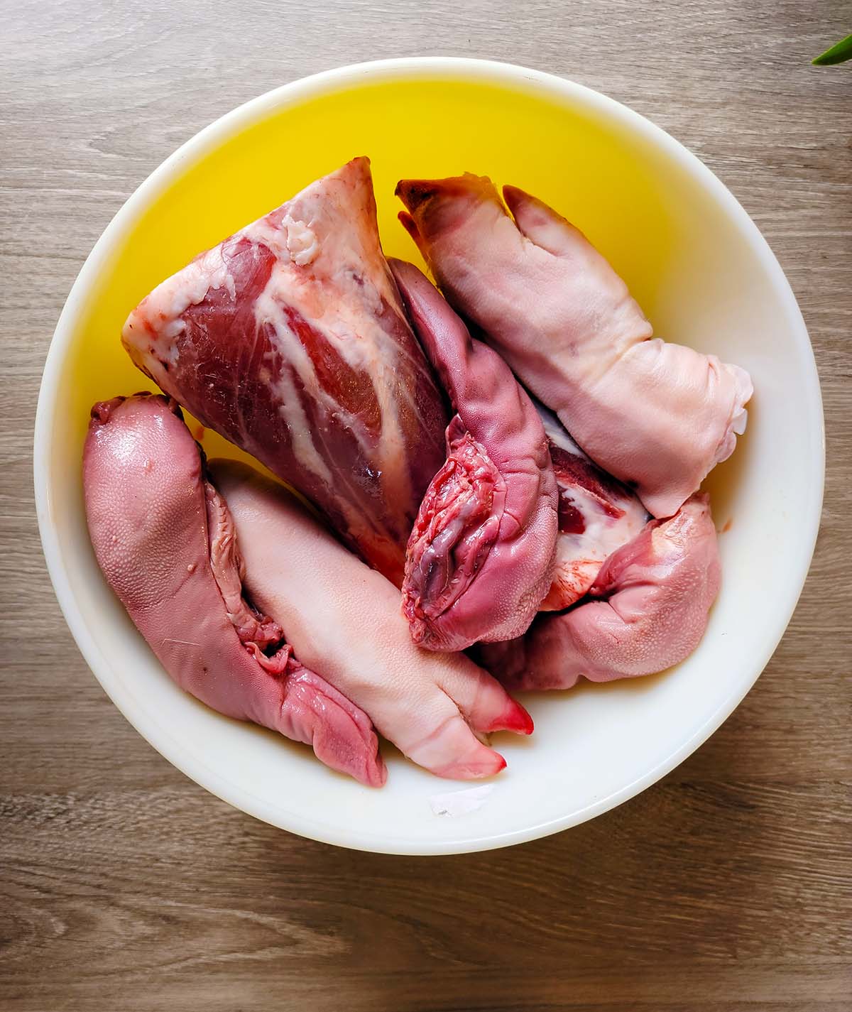 Various wobbly bits in a bowl, ready to cook.
