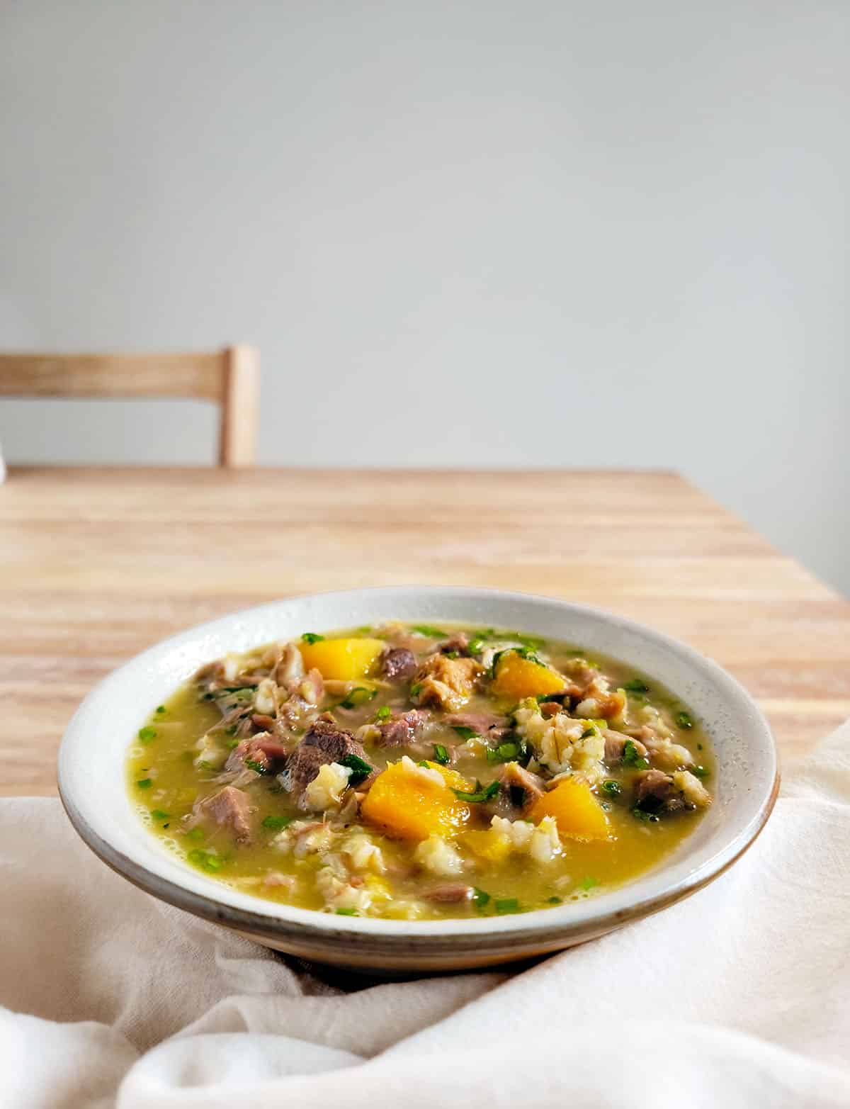 A bowl of Scottish powsowdie on the table, ready to eat.