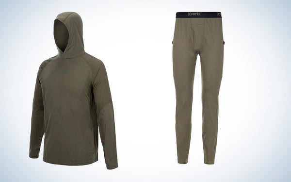 The green Vertx merino base layer and bottom on a black and white gradient background.