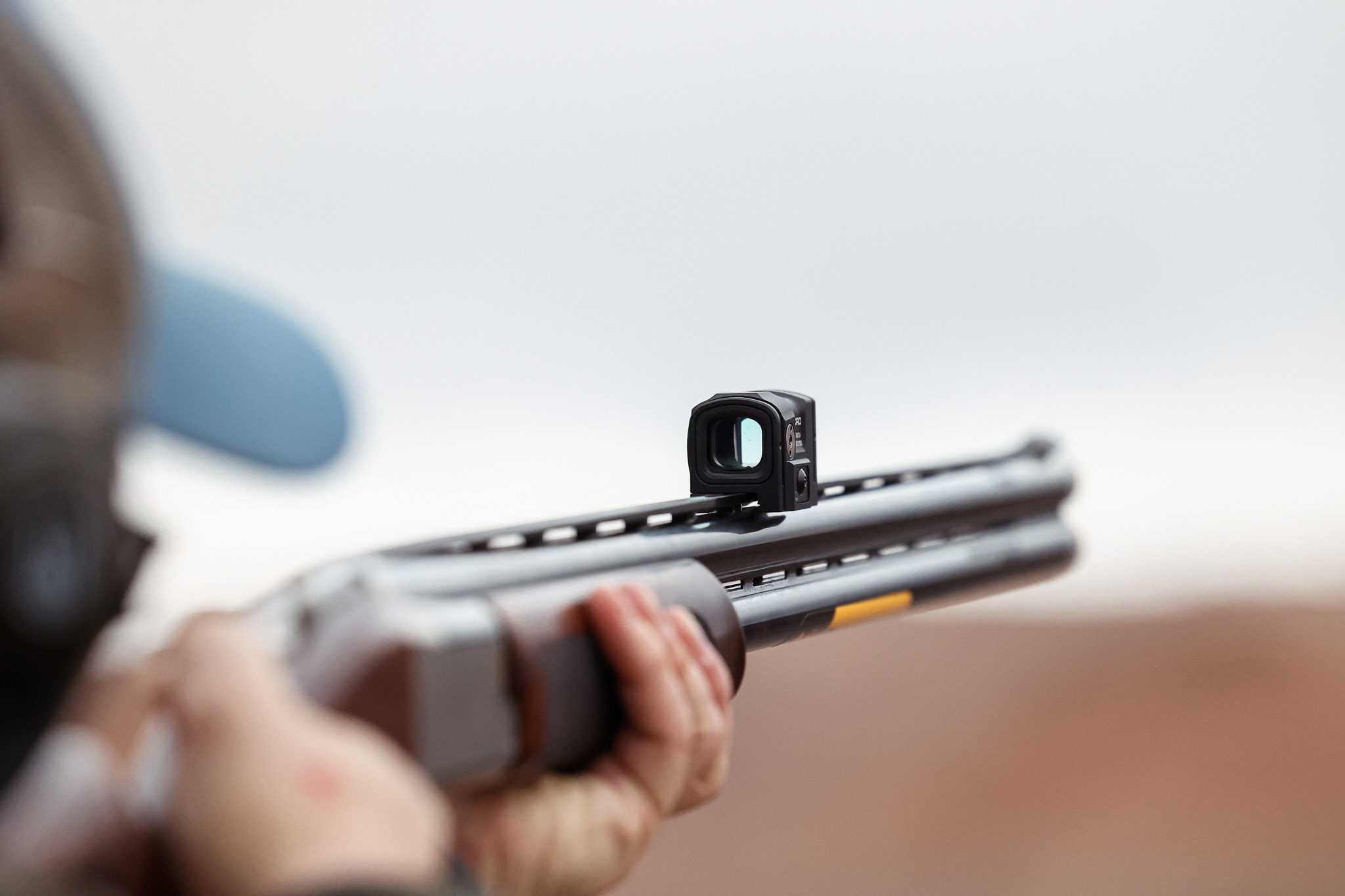 A red-dot on an over/under shotgun.