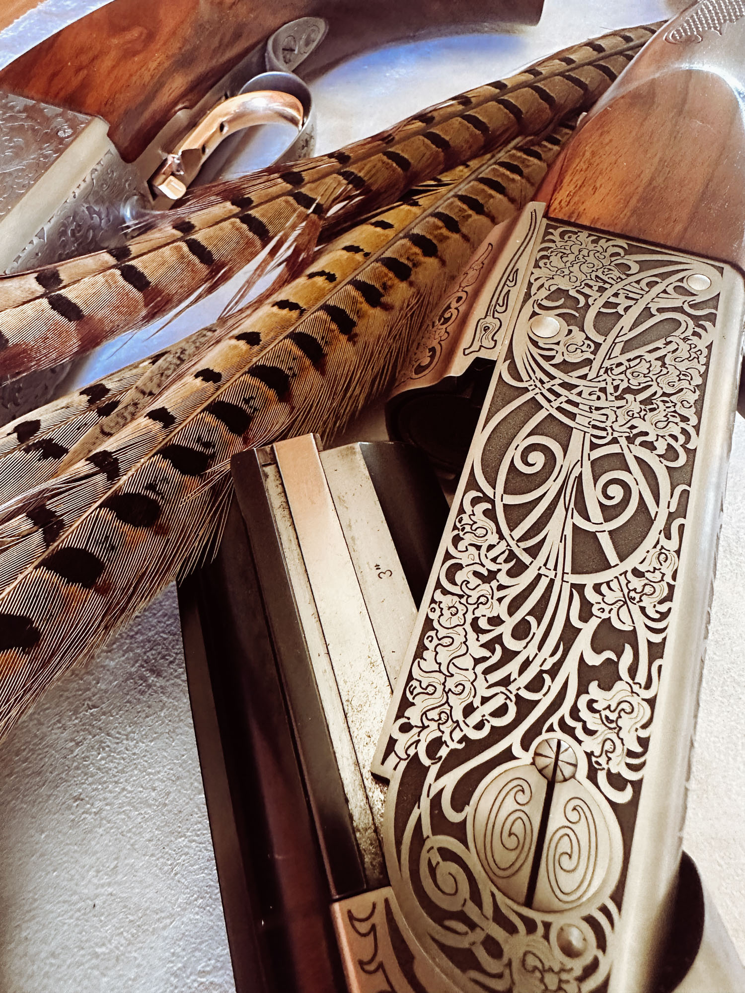 Krieghoff K-20 Victoria action with pheasant feather