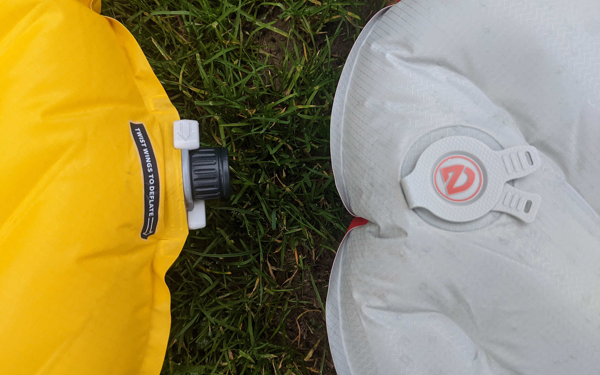 The Therm-a-Rest NeoAir series, left, has a more traditional looking valve than the flat style of the Nemo Tensor series. 