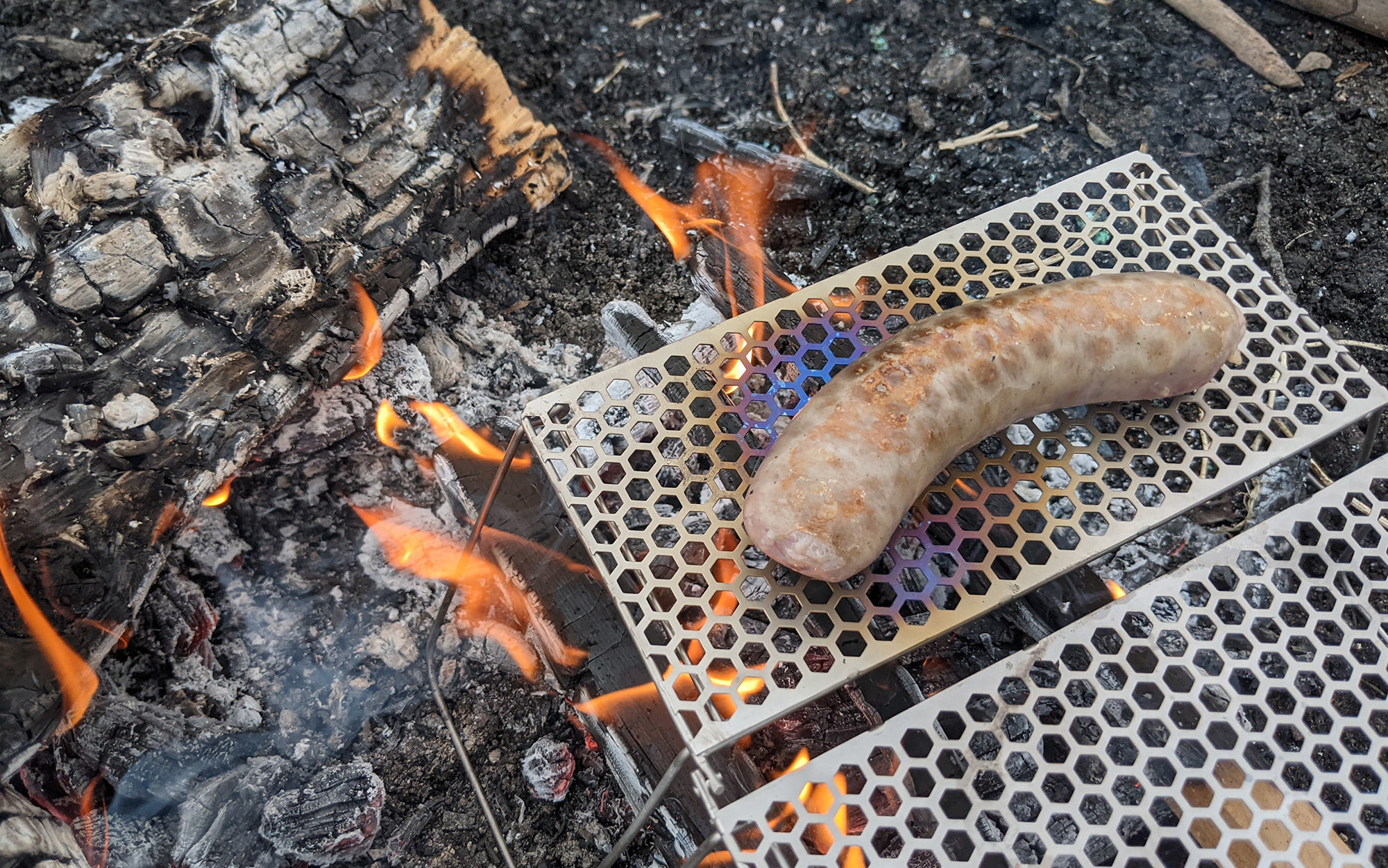 The discoloration on the Vargo Titanium Bifold Grill is a result of the material being used, but does not affect its overall durability. 