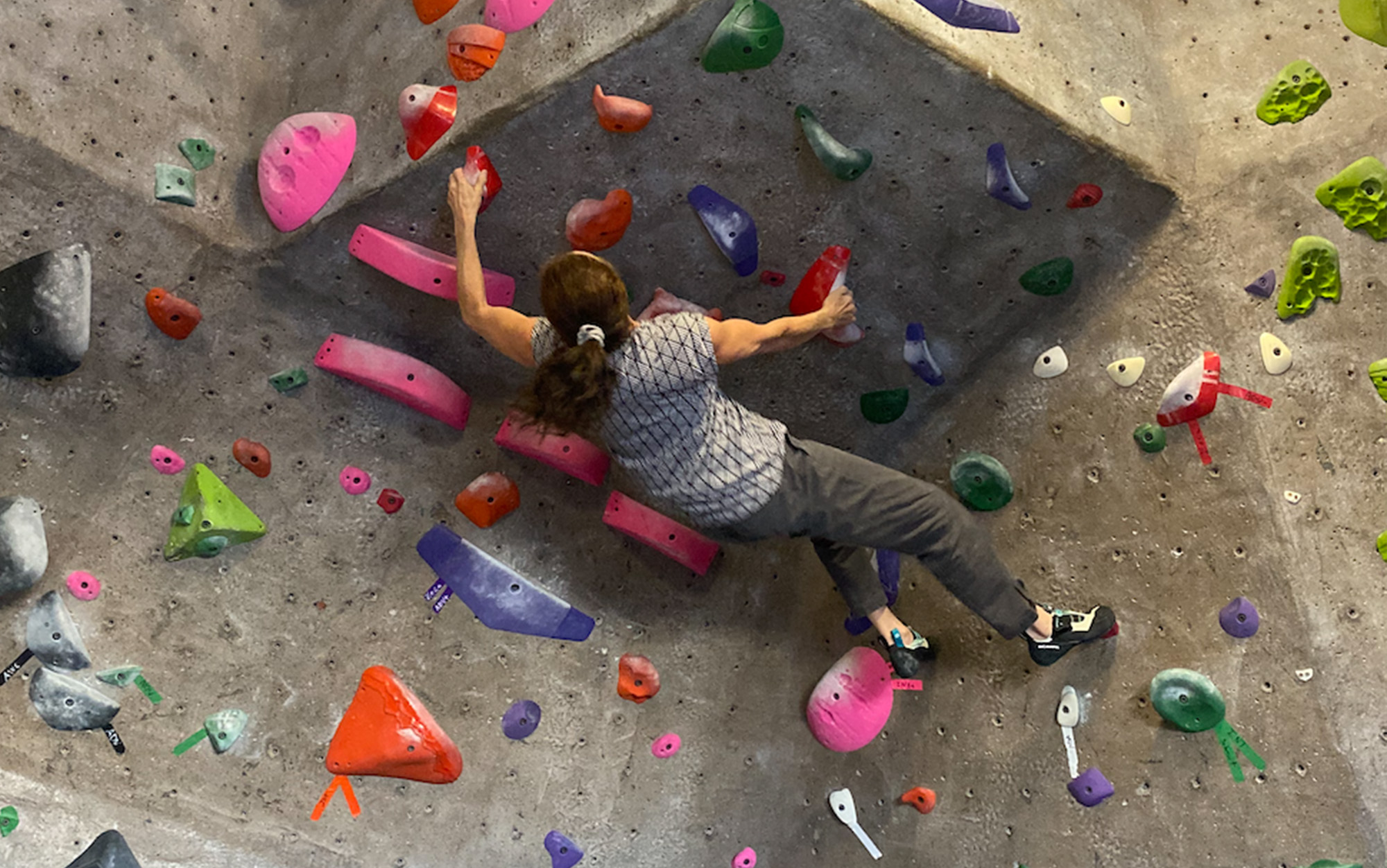 Climber wears Scarpa Vapors in the gym.