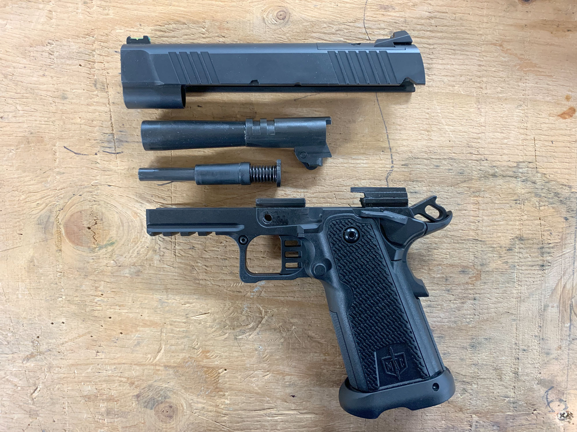 Field-stripped MAC 9 DS 9mm