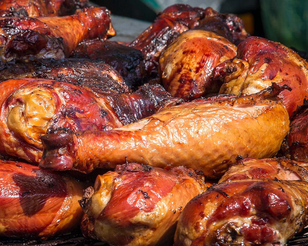 BBQ turkey legs on the grill. 
